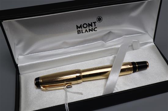 A Montblanc Boheme gold-toned rollerball pen, with faux topaz jewel to clip, boxed